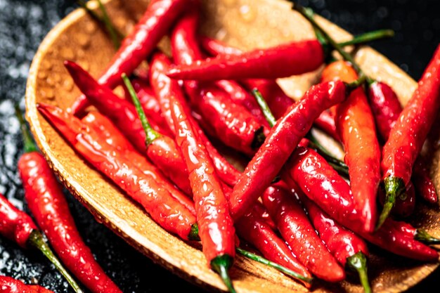 Chili peppers on a wooden plate