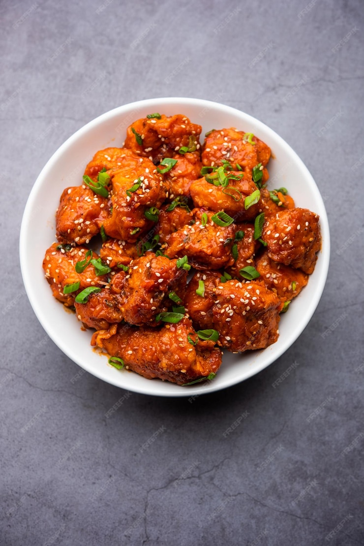 Premium Photo | Chilli chicken dry is a popular indo-chinese dish of ...