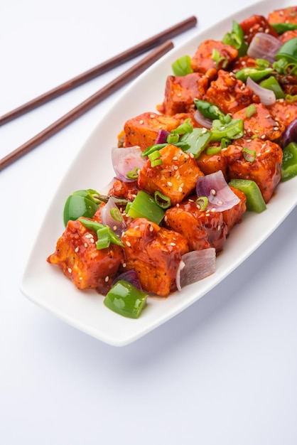 Chilli paneer dry is made using cottage cheese, Indo chinese food