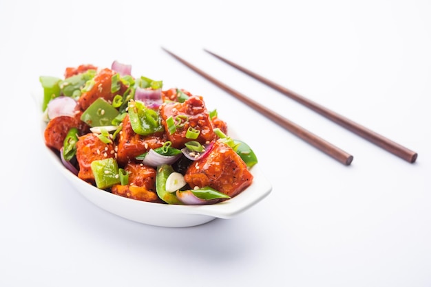 Chilli paneer dry is made using cottage cheese, Indo chinese food