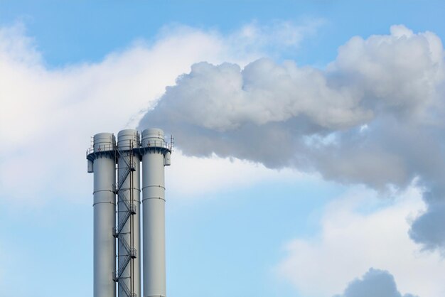 Chimney against the background of clear sky the concept of saving the atmosphere copy space