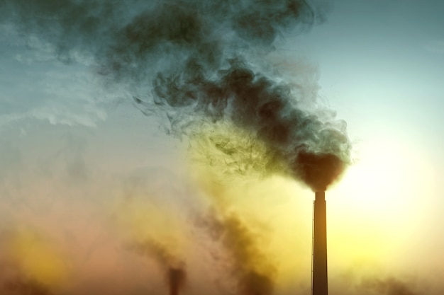 Photo chimney results in air pollution from the industrial activity