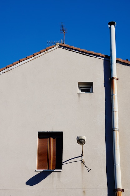 chimney on the rooftop of the house, architecture in Bilbao city, Spain