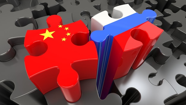Фото Флаги китая и россии на кусочках головоломки. концепция политических отношений. 3d рендеринг