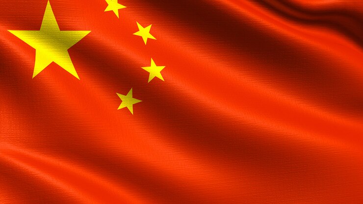 中国の旗、手を振っている布の質感