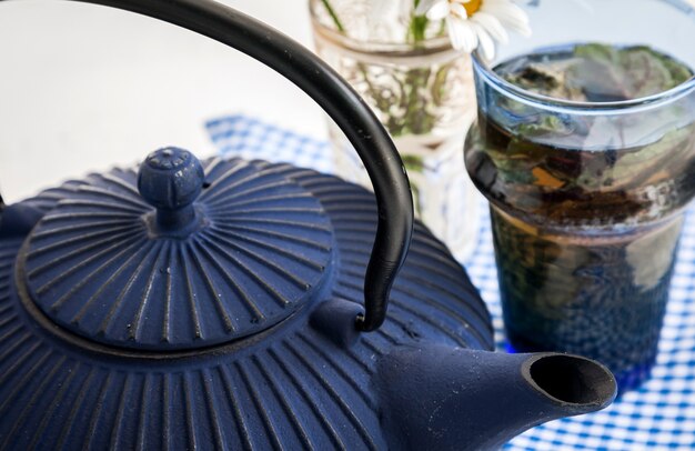 China teapot with flowers and cakes