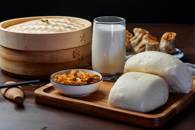 Chinese breakfast. Steamed buns and porridge are on the table