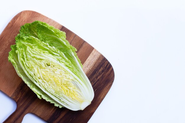Chinese cabbage on white wall Copy space