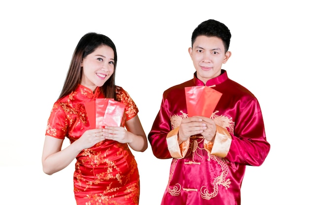 Chinese couple showing red envelope