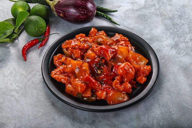 Photo chinese cuisine prawn sweet and sour sauce with vegetables