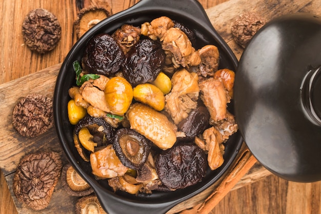 Chinese cuisine: Stir-fried chicken with chestnut and mushroom