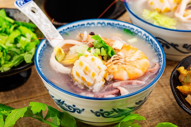 Chinese cuisinea casserole seafood porridgeseafood porridge