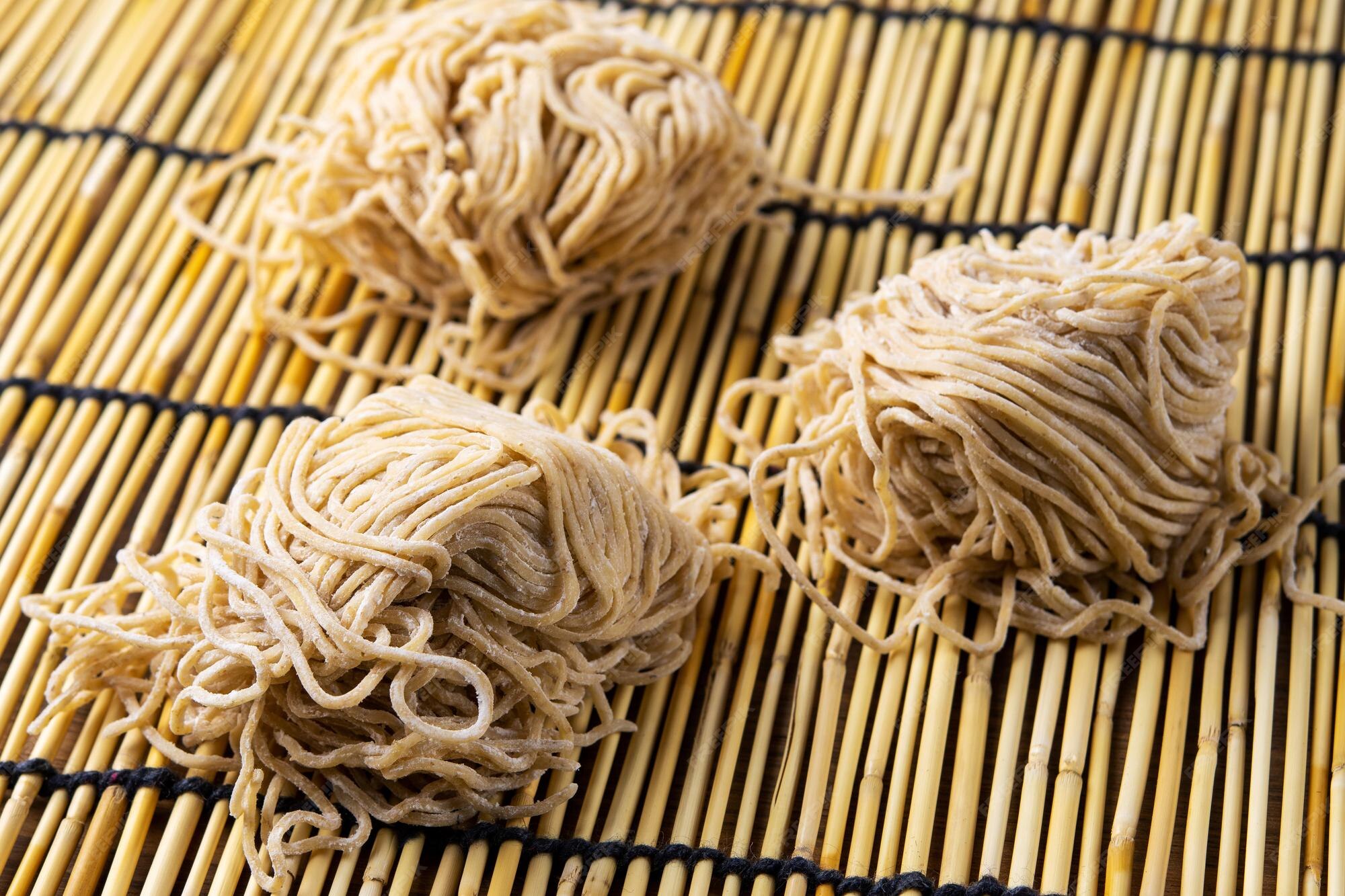 Premium Photo | Chinese dry egg noodles on table