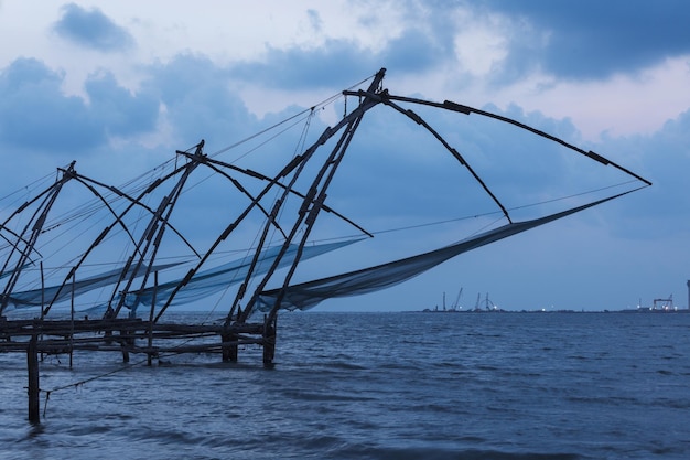 Chinese fishnets in twilight Kochi Kerala India