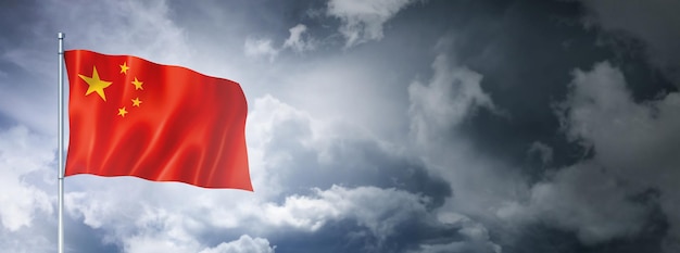 Chinese flag on a cloudy sky