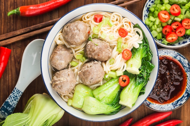 Chinese Food:Meatballs served with noodles,