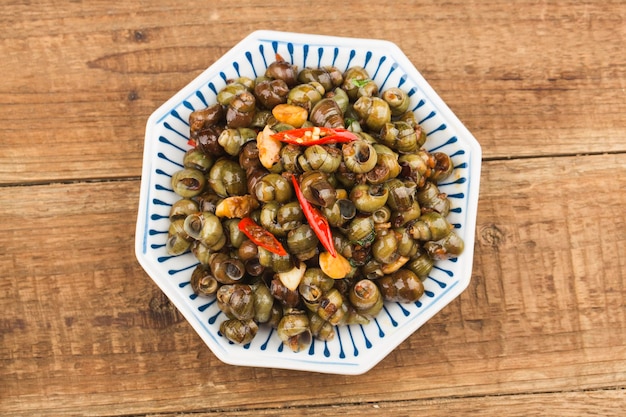 Chinese food: Stir fried snails with thirteen spices