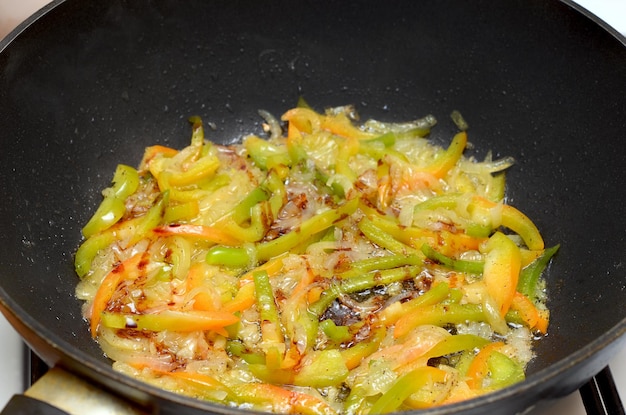 Chinese fried vegetables in a frying pan