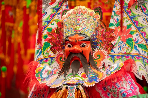 Chinese Ghost Festival people use colorful paper gods to sacrifice