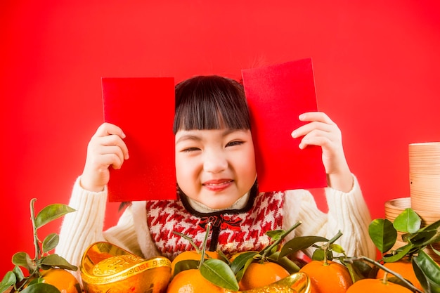 A Chinese girl is happy to welcome the Spring Festival