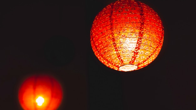 Фото Китайский фонарь на черном фоне
