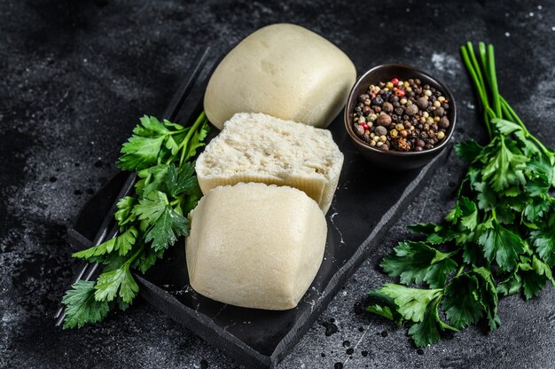 Chinese Lotus paste Steam bun. Black background. Top view.