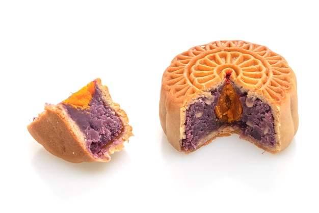 Chinese moon cake purple sweet potato and egg yolk flavour isolated on white background