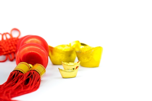 Chinese New Year, Chinese gold ingots and Traditional chinese style (Foreign text means blessing and luckly), isolated on white background