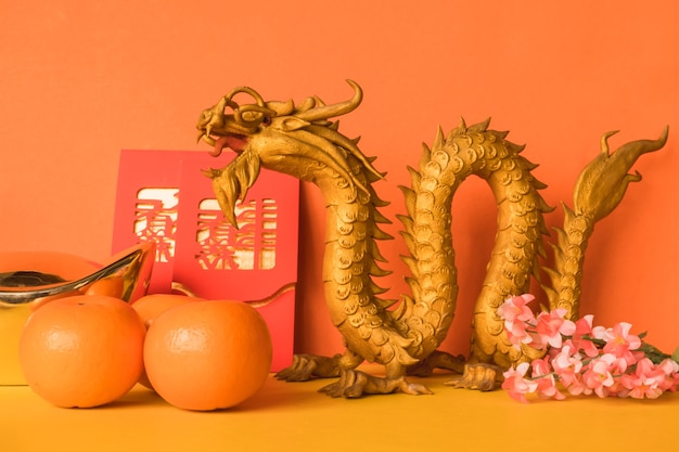 Photo chinese new year festival decorations on color background.
