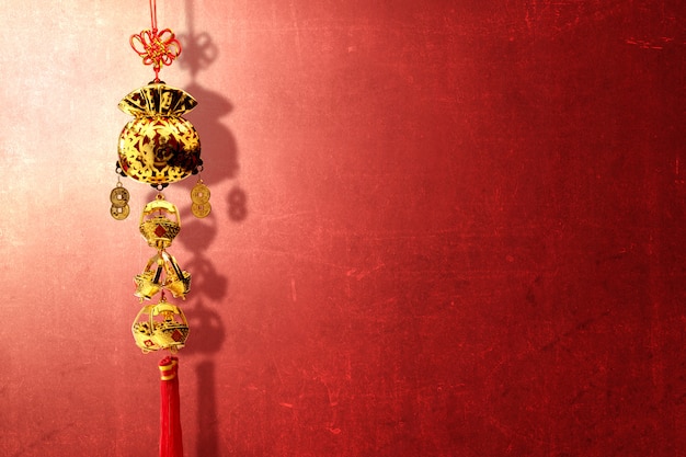 Chinese New Year ornament over red wall