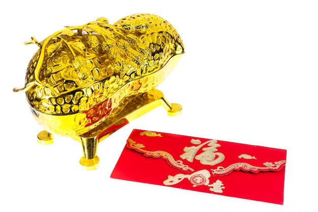 Photo chinese new year  red envelope and ornament, bucket of gold