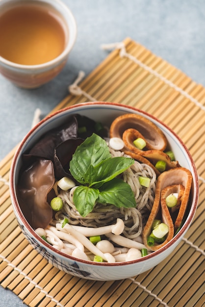 Chinese noodle with vegetables and chopstick