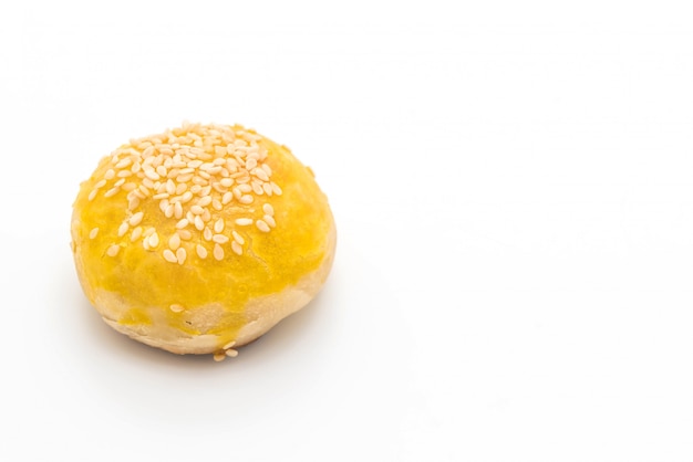 Chinese pastry or moon cake filled with mung bean paste and salted egg yolk 