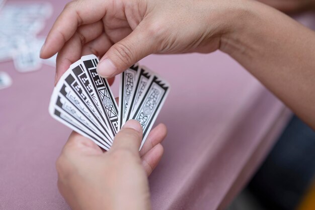 Chinese playing cards on abstract wallpaper background