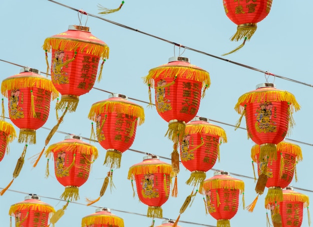 Chinese red lanterns hanging on blue sky