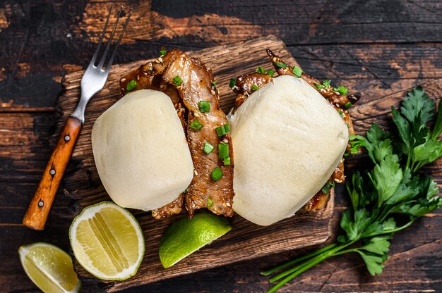 Chinese sandwich steamed gua bao buns with pork.