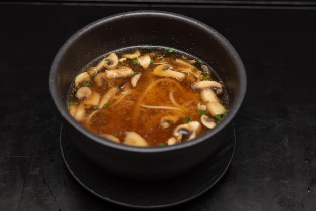 Chinese soup with mushrooms and noodles