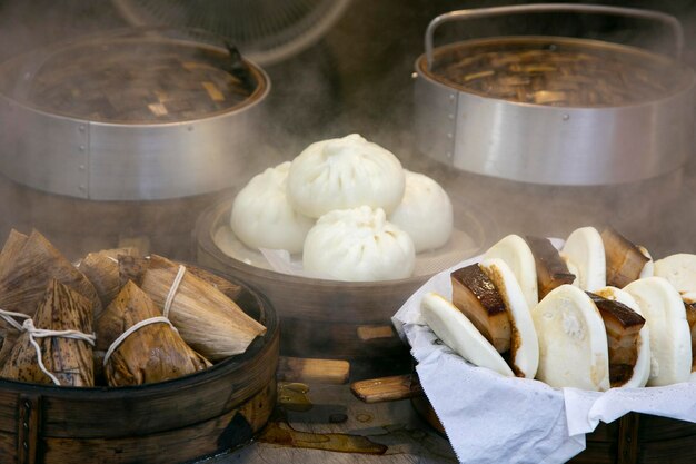 Chinese steamed buns filled with pork street food in Nankinmachi neighborhood in Kobe Japan