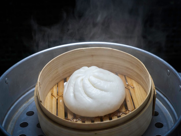 Chinese steamed meat bun in a hot oven with Smoke drifted is Ready to serve and eat  Asian food