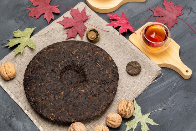 Chinese Tea Ceremony Pu erh on wooden background Selective focus Top view Autumn