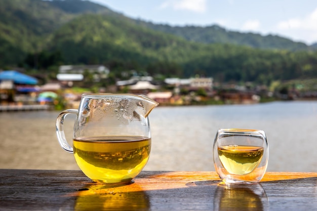 Chinese Tea in a glass jug and a glass cup in tea time