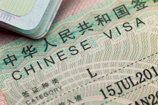 Chinese visa in a passport enjoy travel