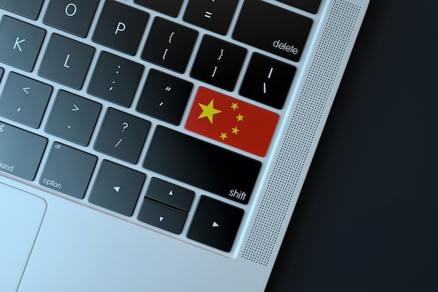 Chinese vlag over computer toetsenbord