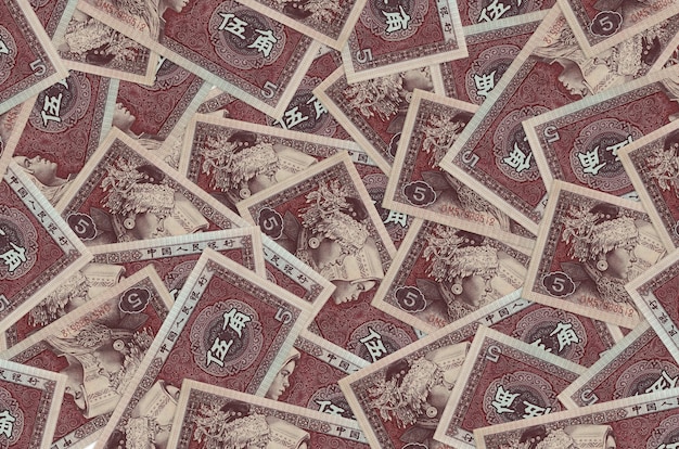 Chinese yuan bills laying in big pile