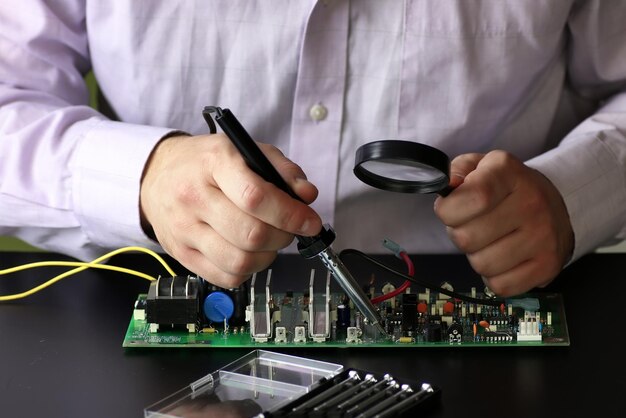 Chip soldering man hands