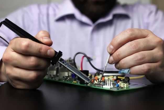 Chip soldering man hands