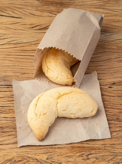 Chipas, typical south american cheese bun on a paper bag.