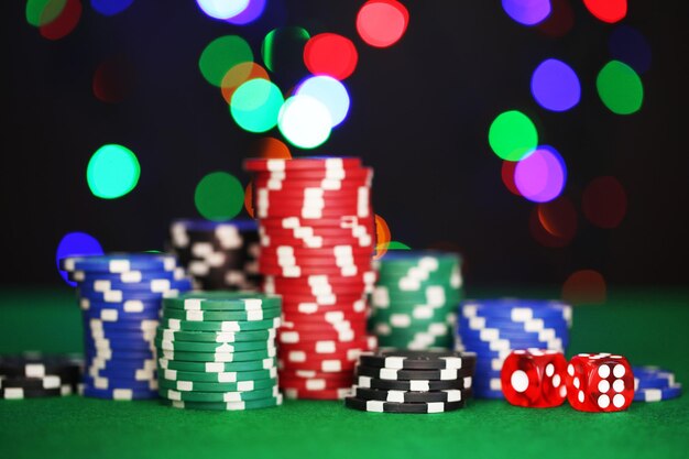 Chips for poker on shiny background