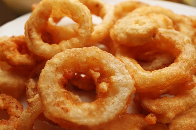 Chips rings with sauce on plate