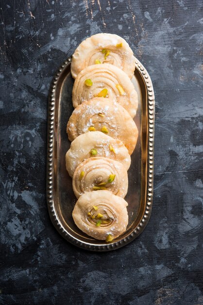 Chirote or Chiroti is a sweet dish from Karnataka and Maharashtra. Served in a plate as a dessert on Festivals or wedding. Selective focus